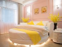 黎平MOMO青年酒店 - 粉色浪漫普通圆床房