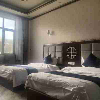 芒康邦達大酒店 Rooms