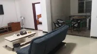 Mengla Yijia Hotel