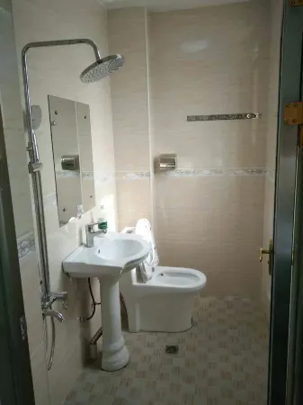 Xinhui Hostel Отели в г. Жуюань