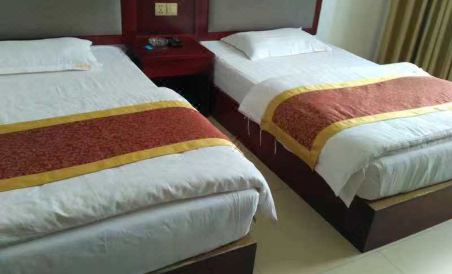 Mengla Heshun Hotel - Housity