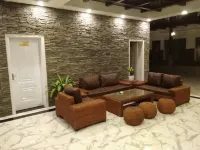 Jinghong Manzhelan Inn - Holiday Apartments