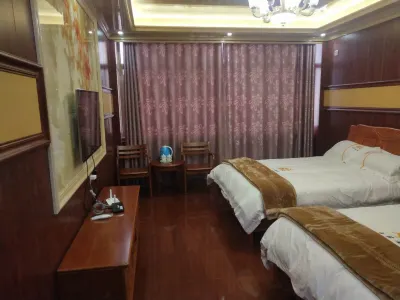 Mangkang Bailong Hotel Hotels near Dameiyongxue Mountain