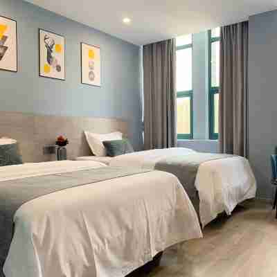 肥東亞美酒店 Rooms