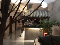 Moyan Inn Hotéis em Condado de Xinping Yi e Dai