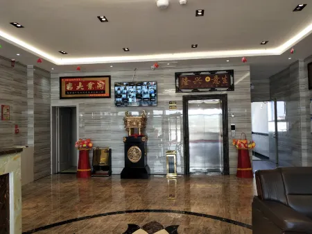 Junhao Business Hotel Отели рядом с достопримечательностью «Правительство графства Цзимулу»