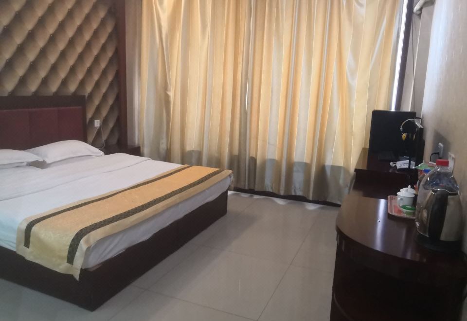 바오더 윈징 비즈니스 호텔 객실