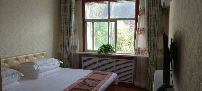 Lintan Tongyuan Farmhouse Hotels in Lintan