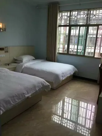 Xinyi Hotel Отели в г. Суйнин