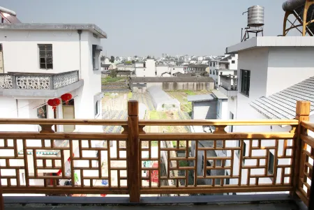 Xiuning Hengjianglou Homestay Отели рядом с достопримечательностью «Huangshan Panda Ecological Paradise»