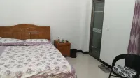 Mengla Yijia Hotel