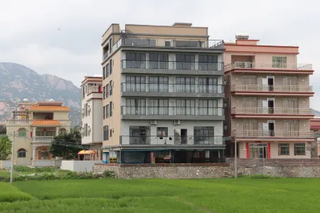 Xingyuan Haipan Hotel Отели рядом с достопримечательностью «Langqin Bay»