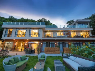 Xinchang Seven Semi Art Houses Hotels near Xiaohuangshanda Canyon Drifting
