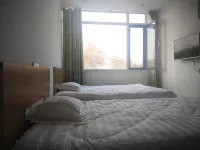 Jiaozhou Xianghe Hotel - Inns