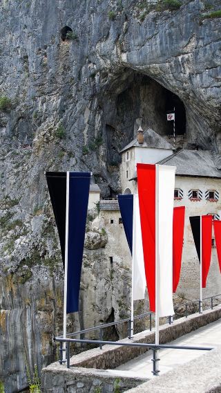 Slovenia Predjama Castle + Postojnska Caves Half-Day Tour