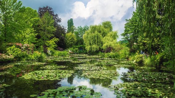 法國莫內花園梵谷故居一日遊巴黎來回獨立成團中文司機飯店接送