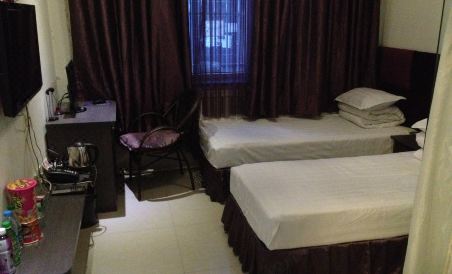 Qian Bai Du Clock Theme Hotel - Housity
