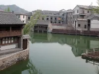 Wolong Fort Inn โรงแรมใกล้กำแพงเมืองจีนซือหม่าไถ