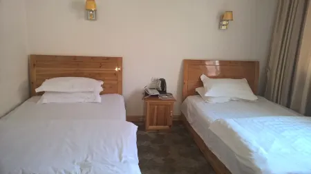 Jianhe Yinlan Fashion Hotel Отели в г. Цзянхэ