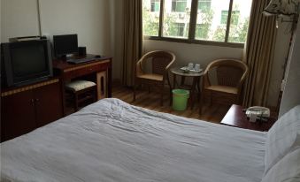 Xunwu Xinri Hotel