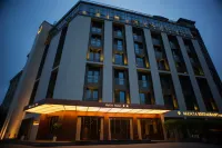 MaXim Hotel Отели в г. Юнкан