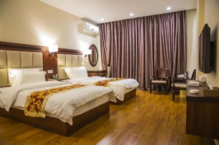 Yihao Business Apartment Отели рядом с достопримечательностью «Tonggufeng Scenic Area»