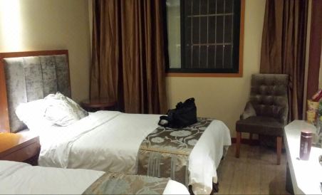 Yi Long Hua Chen Impress Business Hotel - Housity