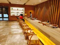 Soaring Dragon Tea Culture Hotel (Hanzhong High-speed Railway Station Wanbang Flagship) - Pet friendly