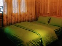 西江床吧国际青年旅舍 - 清新果绿大床房