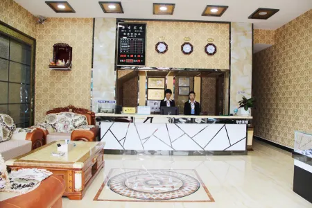 Huaji Hotel, Luchuan Отели рядом с достопримечательностью «Longchuan Gymnasium»