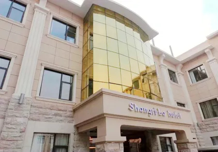 Xinzheng Shangri-La Holiday Hot Spring Hotel Отели рядом с достопримечательностью «Huang Di's Hometown»