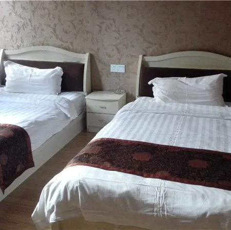 Guyu Yaxin Business Hotel