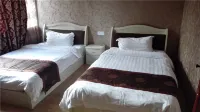 Guyu Yaxin Business Hotel