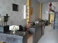 Wanzai Xincheng Business Hotel