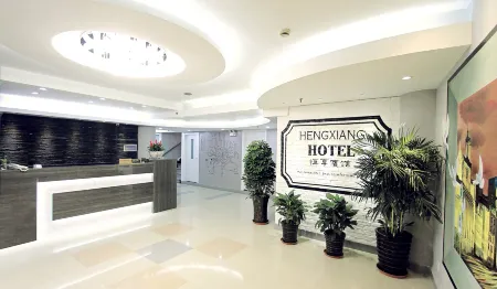 Hengxiang Hotel Отели рядом с достопримечательностью «Minhang Gymnasium»