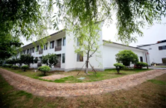 Jiangnan Red Village Hotels near Golden Nails Ancient World Scenic Spot