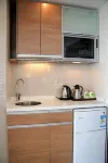 Dongfang Jinzuo Apartment Hotel - Condos