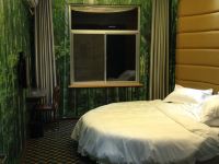 庆阳时光里主题公寓 - 绿色丛林主题圆床房