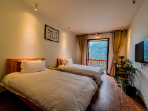 Baoxing Xueshan Home No.46 Inn โรงแรมในเป่าซิง