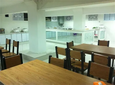 Tangwanghe Jinpeng Hotel Отели рядом с достопримечательностью «Народное правительство Тунг-Ван»