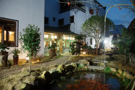 Wuyuan Wangjia Huiyuan·Intangible Cultural Heritage Holiday Homestay Отели рядом с достопримечательностью «Yancun Ancient Building Complex in Ming and Qing Dynasties»
