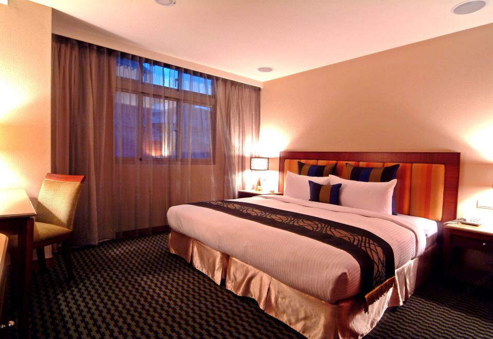 진간 클래식 호텔의 깔끔한 객실 전경