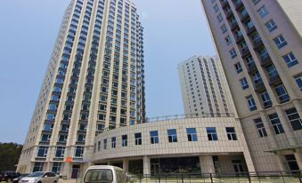 Boze Seaview Holiday Apartment (Weihai International Bathing Beach Torch 8th Street Shop)