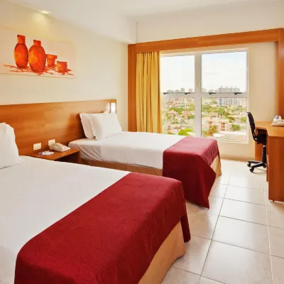 Praiamar Express Hotel Hotels near Dunnas Shopping Mall