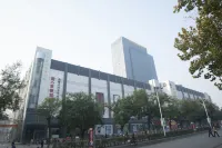 New Cooperation International Hotel Hôtels à : Feicheng