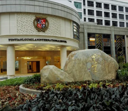 Yuntianlou Milan International Hotel Отели рядом с достопримечательностью «Xuezi Square»