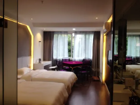 Teou Hotel Отели рядом с достопримечательностью «Nantong Mining Industry Company Workers Culture & Sport Center»