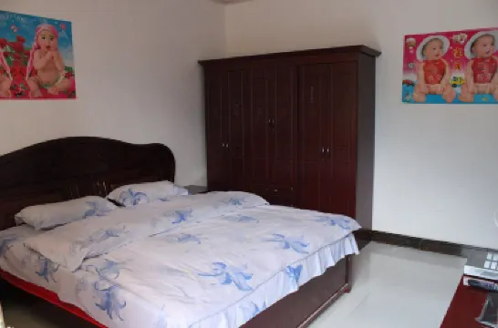 Yinjie Inn Hoteles cerca de Wulong Village