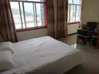 Beichuan Yueyi Xinjie Business Hotel