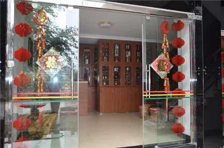 Tangchi Junhao Business Apartment Отели рядом с достопримечательностью «Dixiadao Stone Forest»